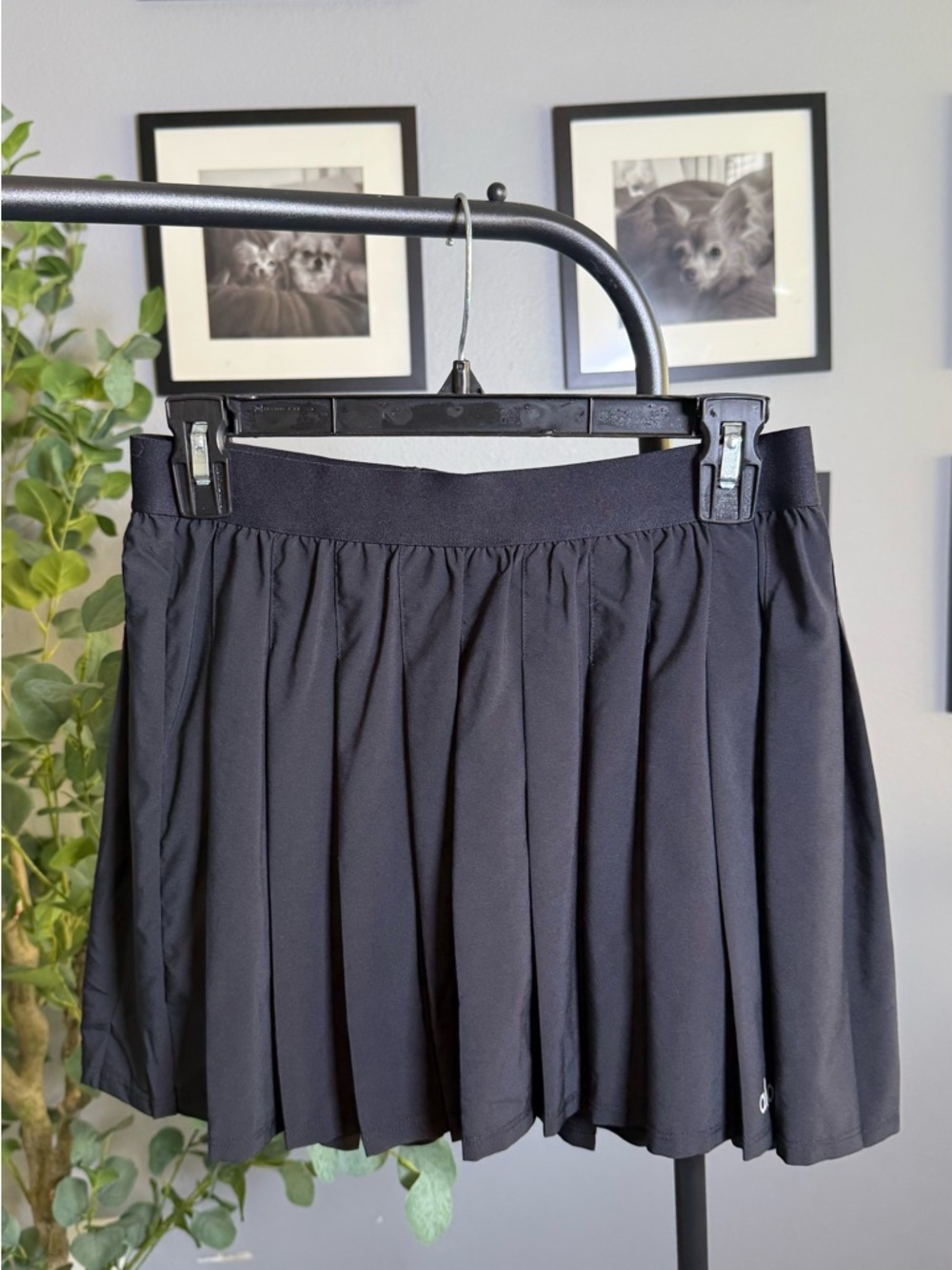 ALO Yoga black athletic skort with reflective logo